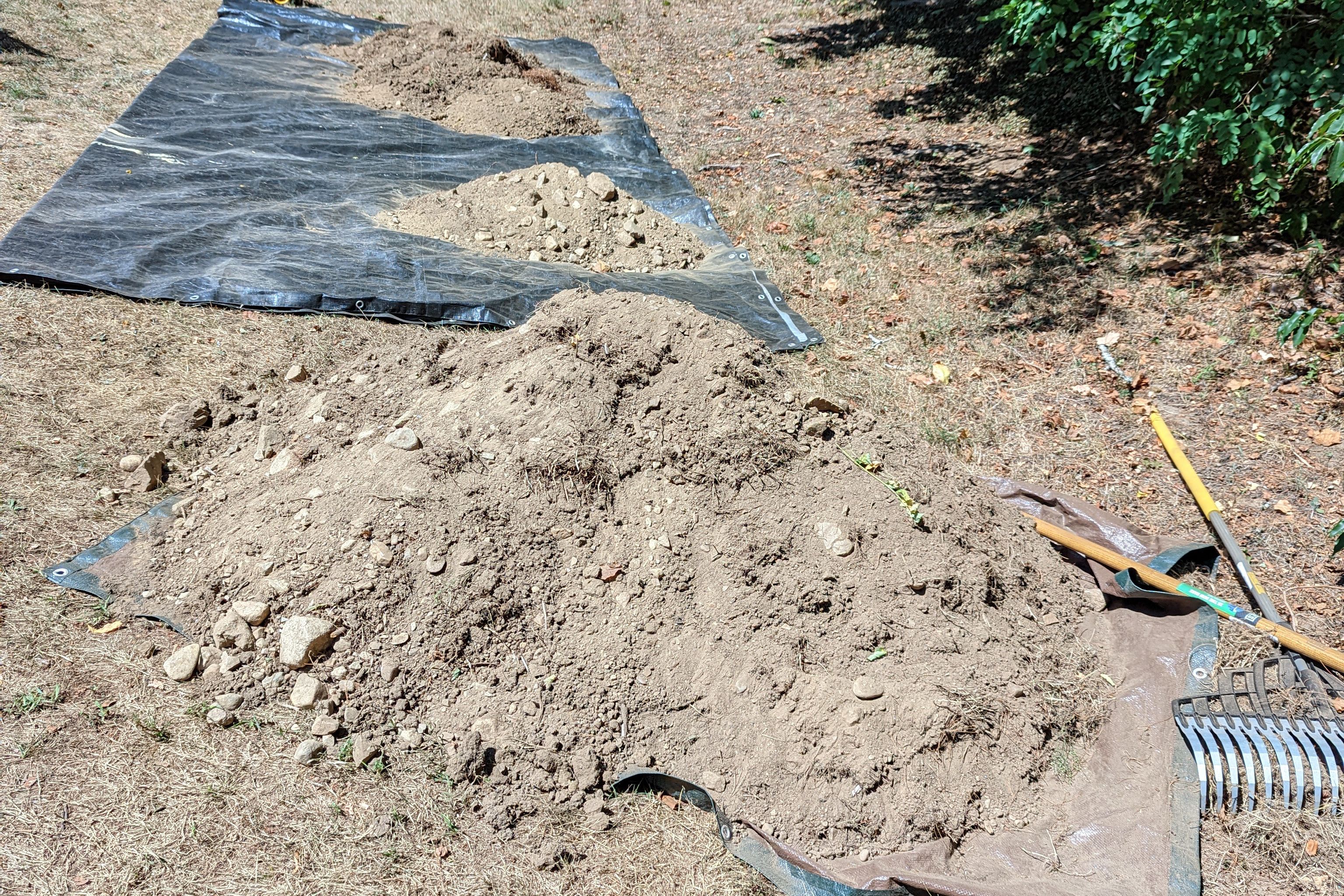 Tarp with fresh dirt